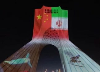Negative reflections of the image of the Chinese flag on Freedom Square, Tehran, Iran!