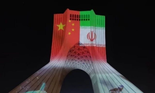 Negative reflections of the image of the Chinese flag on Freedom Square, Tehran, Iran!