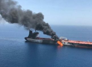A tanker carrying half a million barrels of Iranian oil caught fire near China
