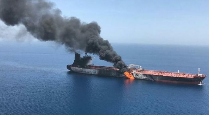 A tanker carrying half a million barrels of Iranian oil caught fire near China