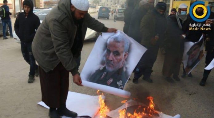 Burning pictures of Qassem Soleimani and Hassan Nasrallah in the city of Rafah, Gaza Strip